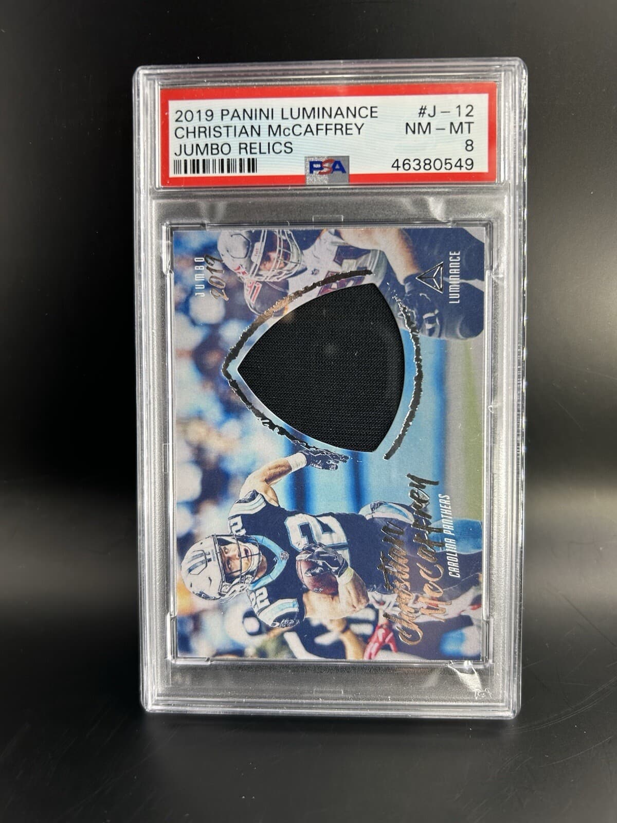 2019 Panini Luminance Jumbo Relics Christian McCaffrey #J-12. PSA 8. Pop 1.